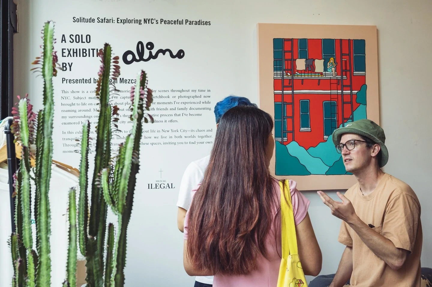 Alimo — Opening Night guests viewing paintings — Solitude Safari, Ilegal Mezcal, Greenpoint, NYC 2023